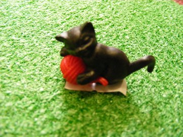 BLACK KITTEN WITH WOOL