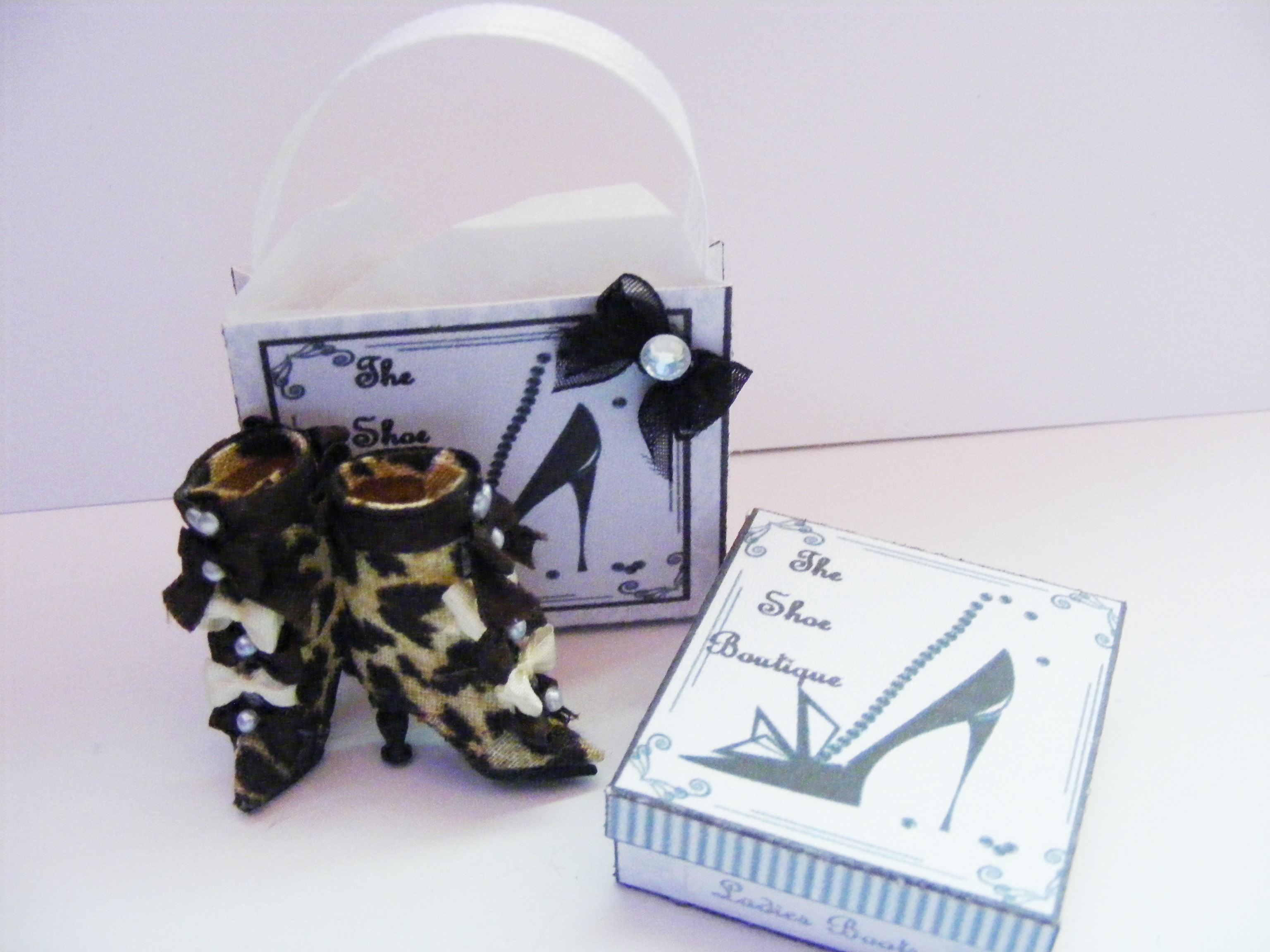 ANIMAL PRINT BOOTS WITH FRONT BOWS
