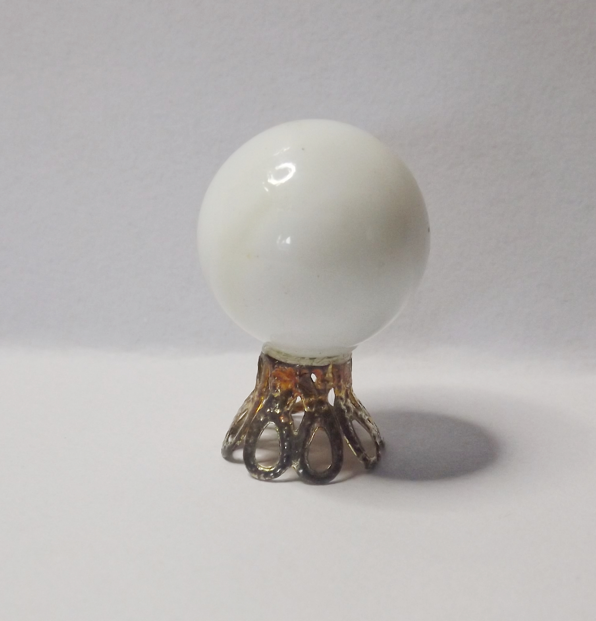WHITE CRYSTAL BALL ON STAND