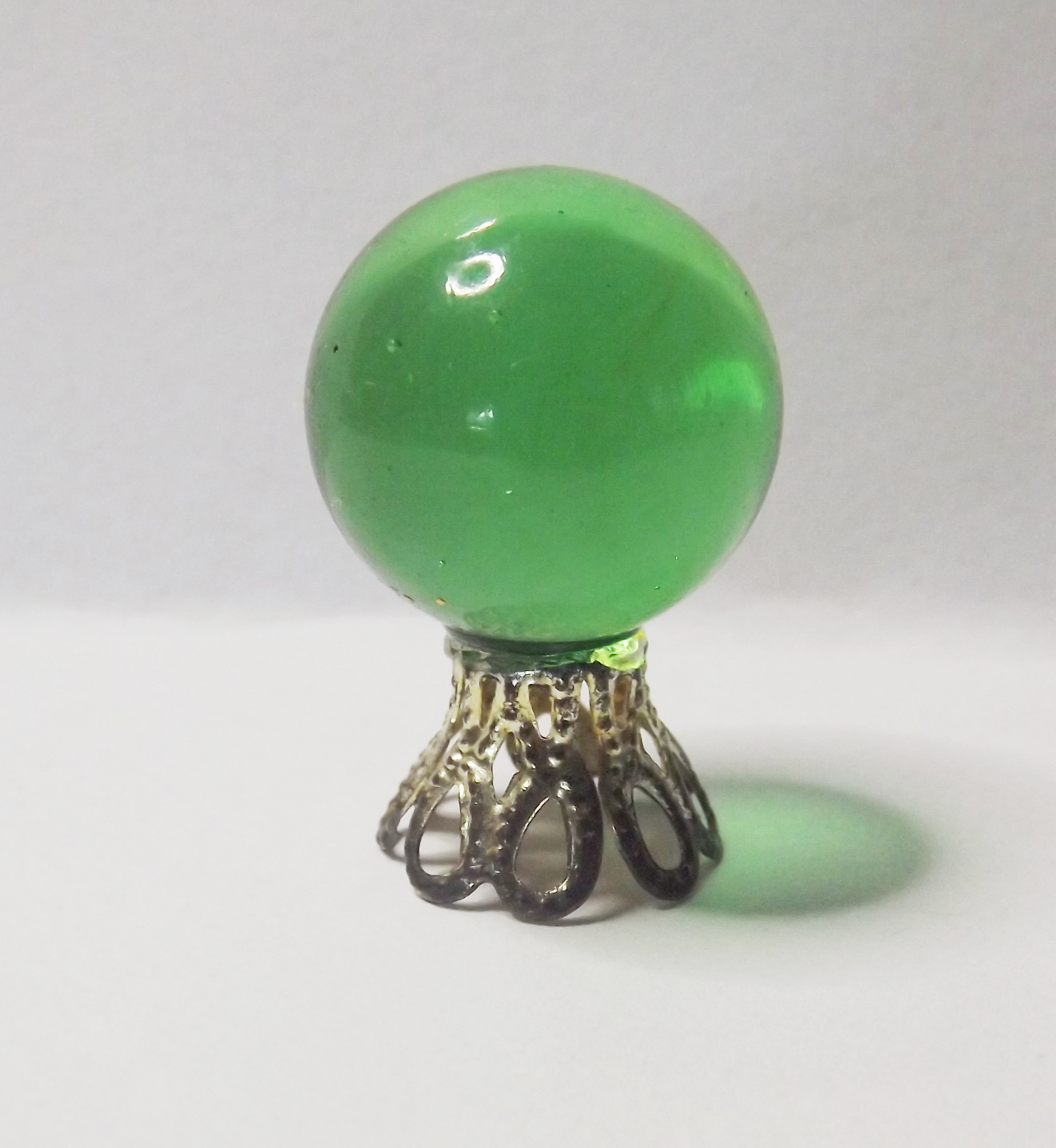 GREEN CRYSTAL BALL ON STAND