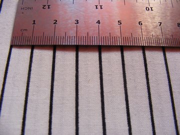 WHITE MATERIAL WITH BLACK STRIP WHITE MATERIAL WITH BLACK STRIP